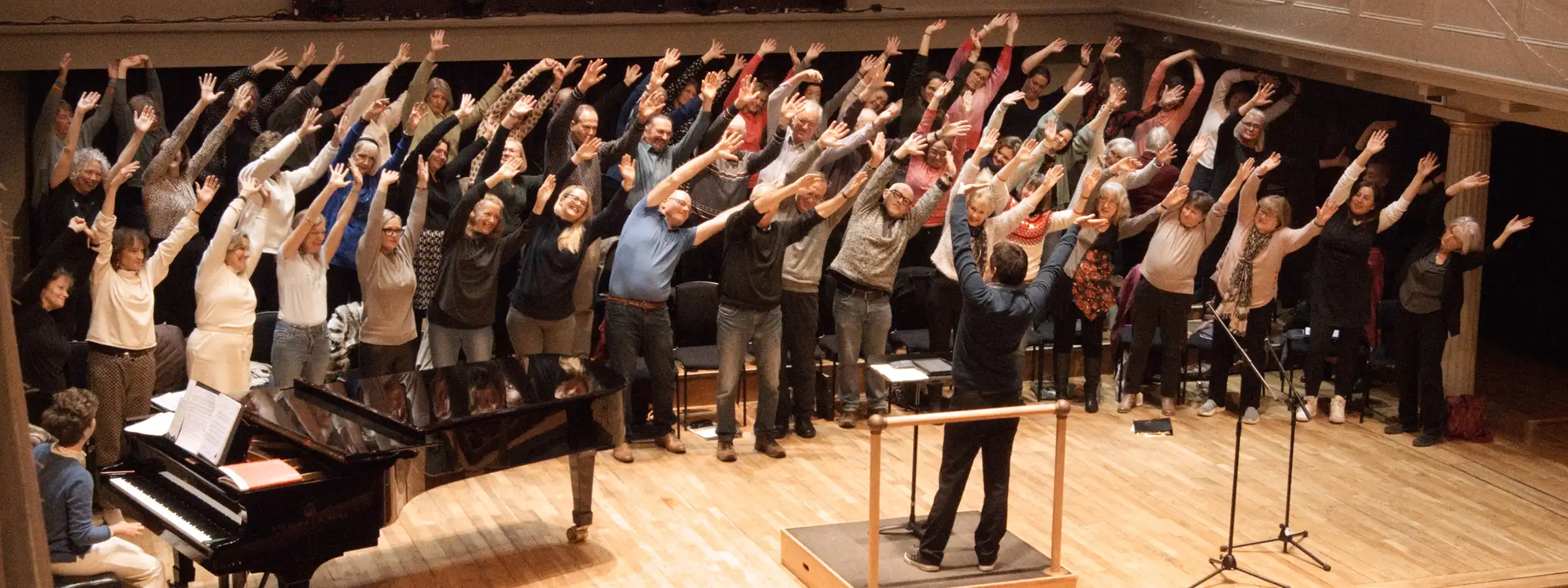 City Voices Bristol warming up at rehearsal